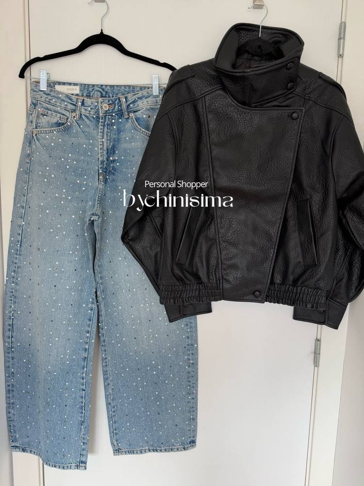 Jean y campera de cuero negra